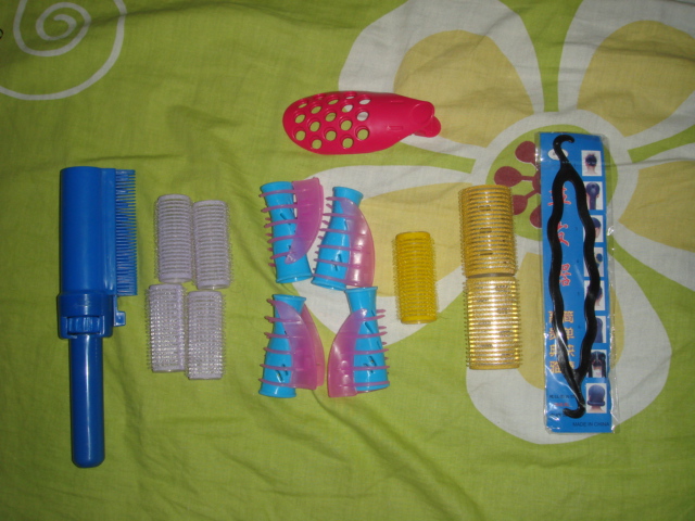 第一个染发的 中间几个弄卷的  最后个盘发的  粉红的那个刘海造型