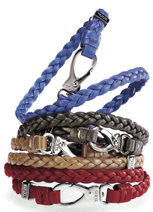 皮革编织的绳索缠绕成一个手环，张扬的色彩为男人增添一份阳光的心情。